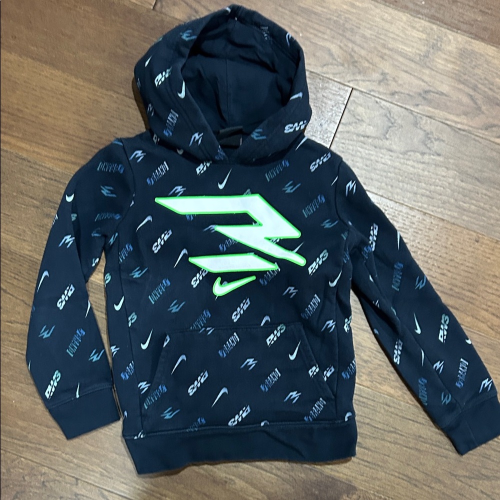 Nike Kids Black Hoodie with Neon Green Logo and All-Over Print